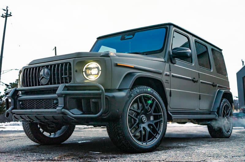 Matte grey Mercedes-AMG G63 on a snowy lot