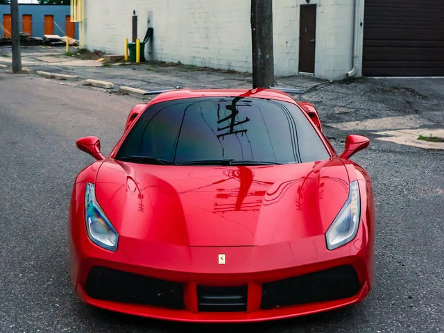 Red Ferrari 488, front view